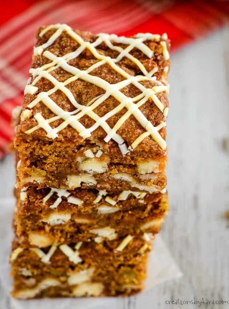 white chocolate drizzle on top of pumpkin squares