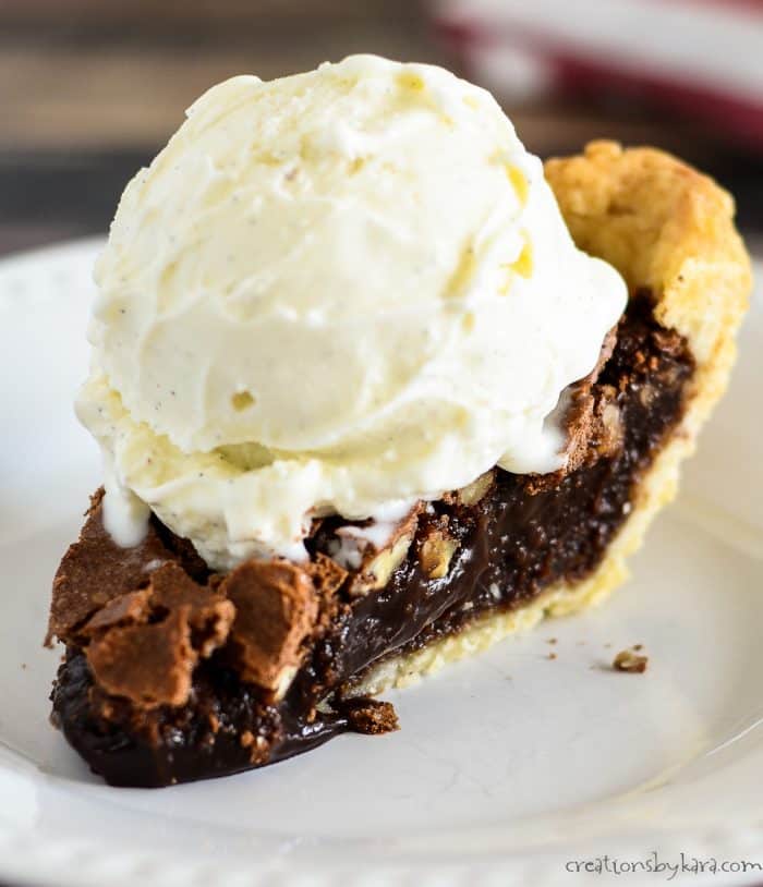 slice of chocolate pie topped with vanilla ice cream