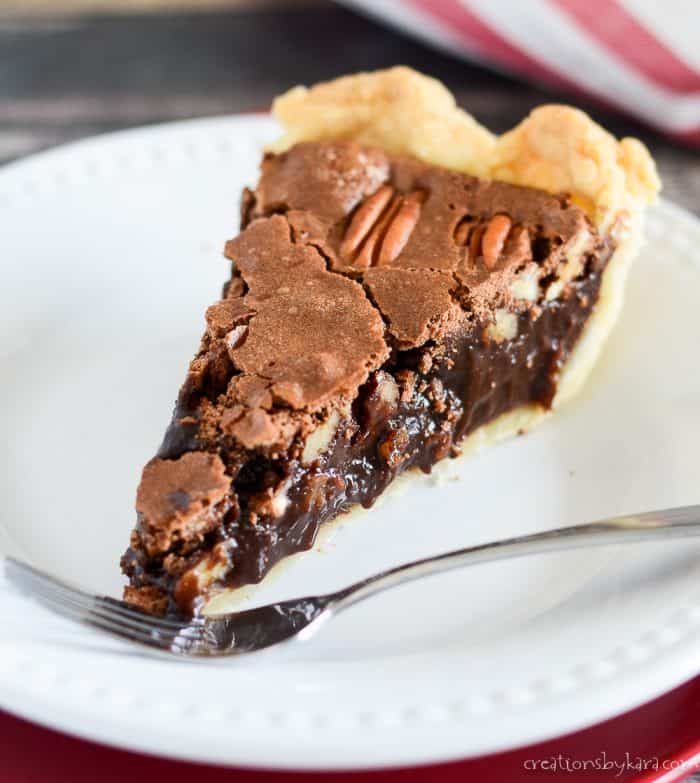 slice of pie with chocolate pecan filling