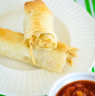 flauta with chicken and cheese filling, broken in half