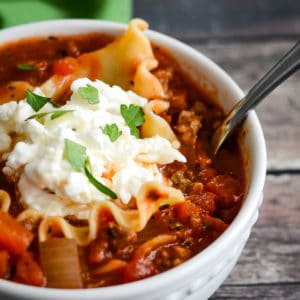 bowl of easy lasagna soup with a spoon in it