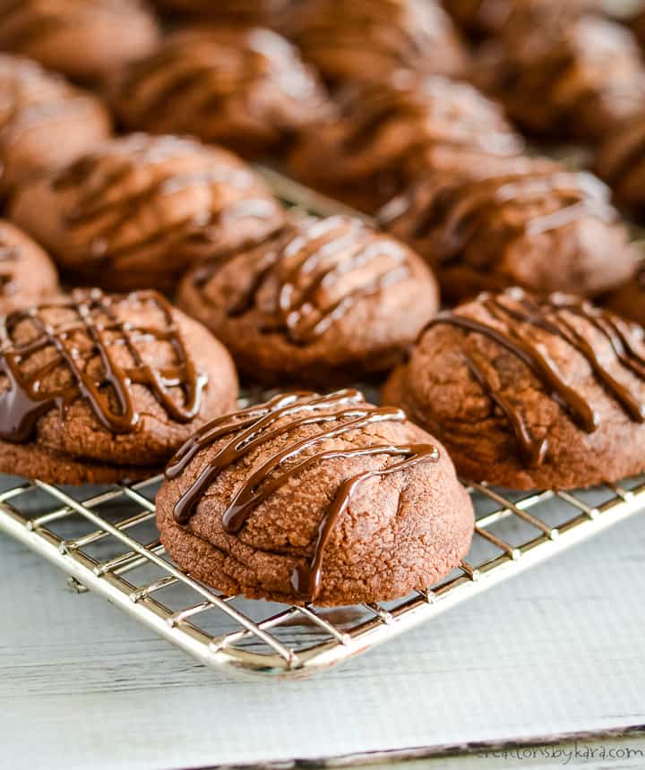 chocolate drizzled mint truffle cookies on cooling rack