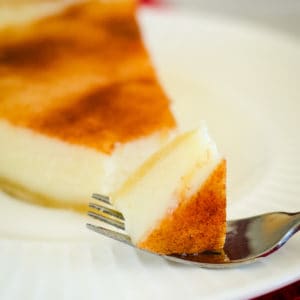 slice of homemade sugar cream pie with a piece on a fork
