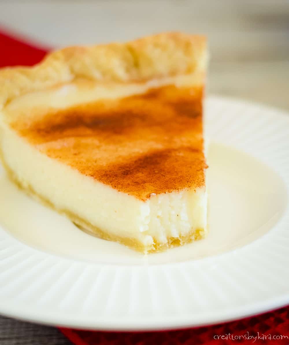 slice of hoosier sugar cream pie with a bite taken out of it