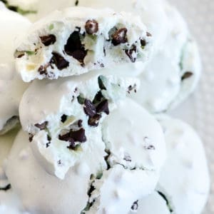 mint chocolate chip meringue cookies on a plate