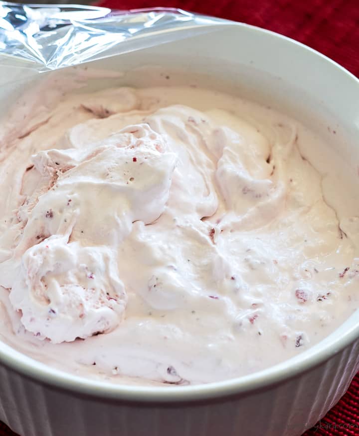 homemade strawberry ice cream after being churned