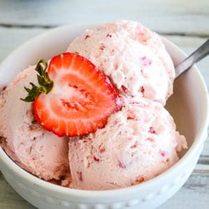 bowl of strawberry ice cream with a spoon