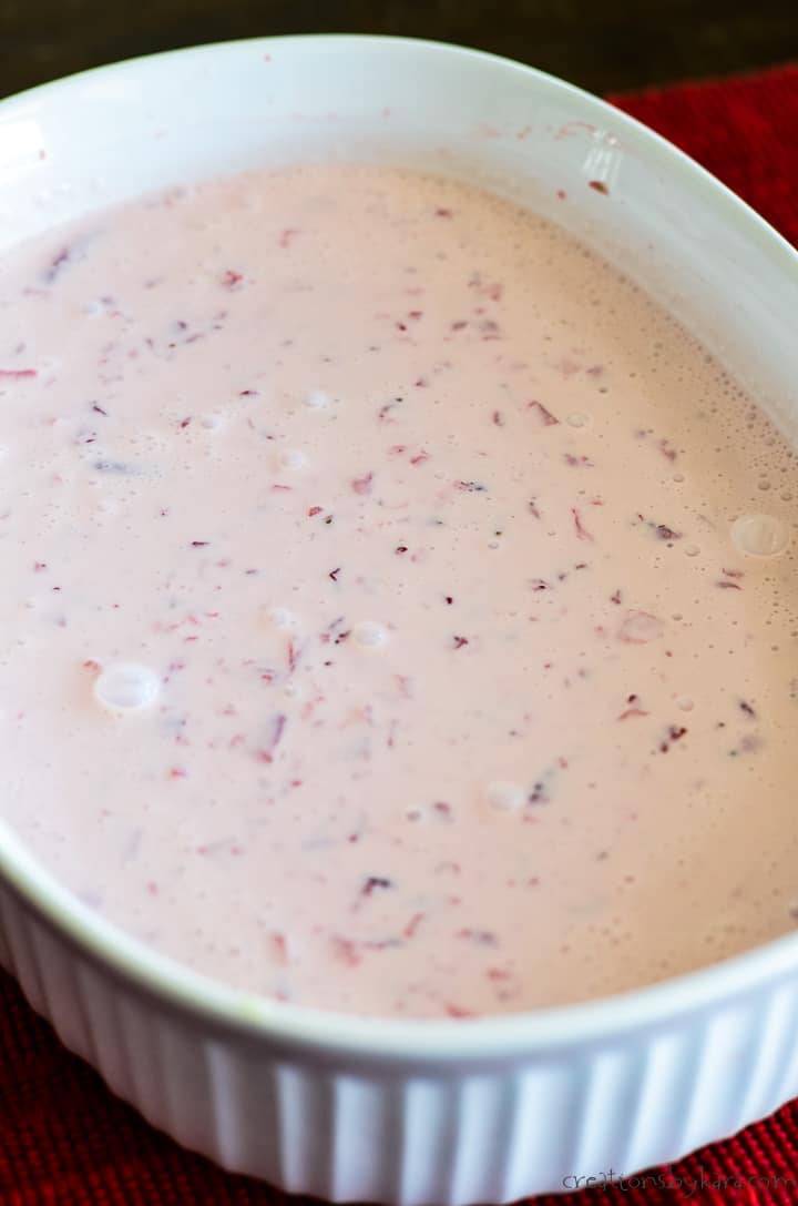 strawberry ice cream base in a container