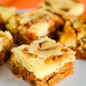 close up of carrot bars with cream cheese