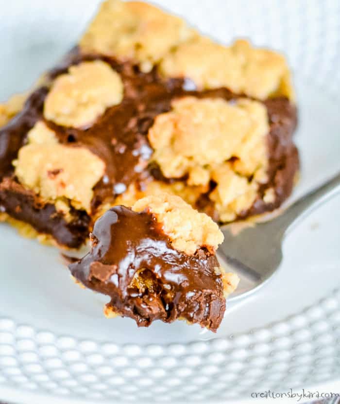 ooey gooey oatmeal fudge bar on a fork