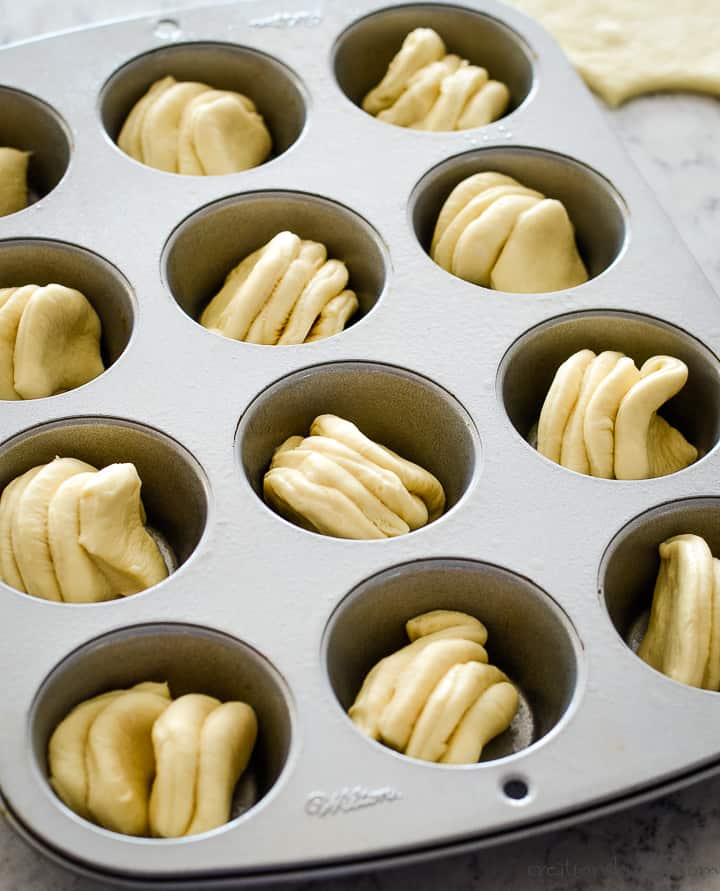 pull apart garlic roll dough in muffin tin