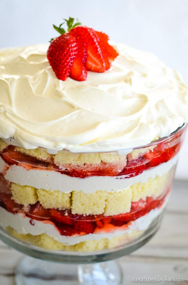 strawberry cheesecake trifle topped with strawberries