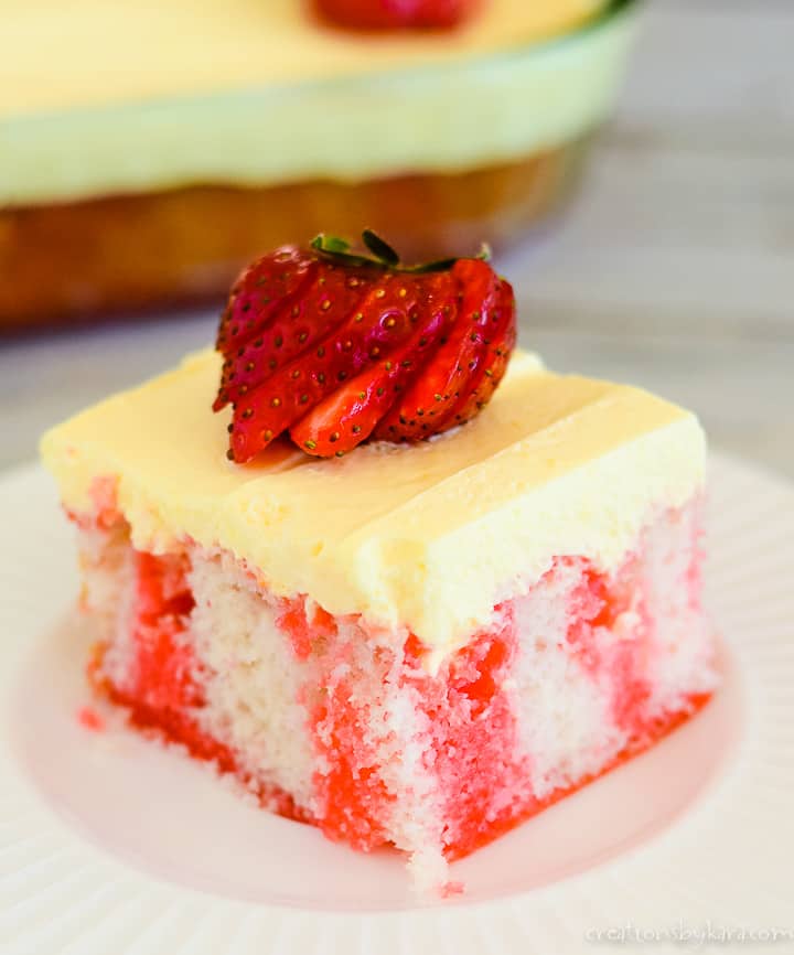 strawberry poke cake with pudding frosting