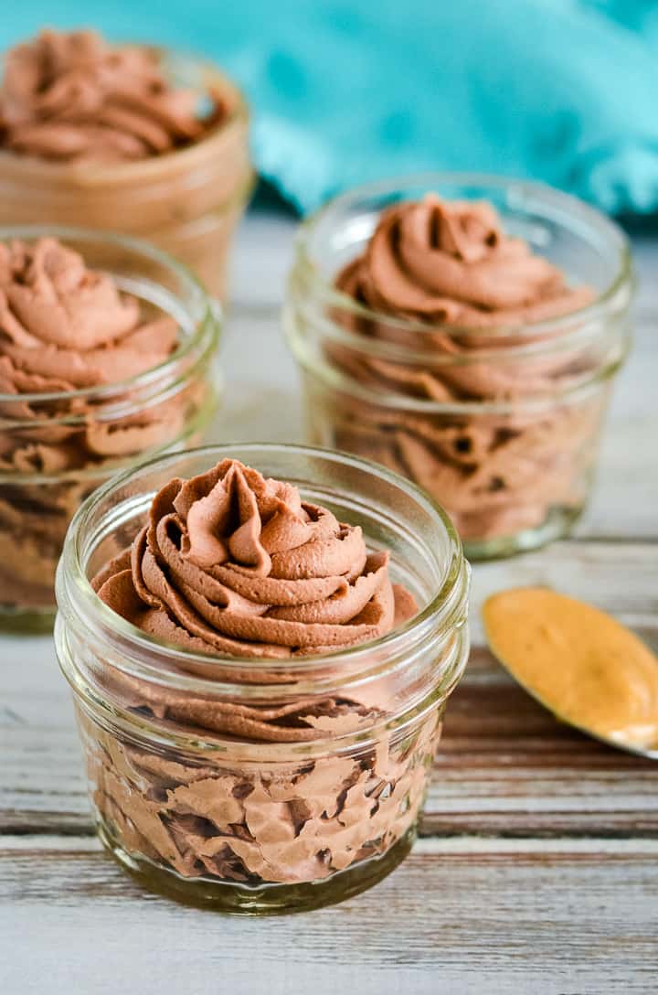 keto chocolate peanut butter mousse in mini mason jars