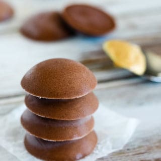 stack of chocolate peanut butter fat bombs keto
