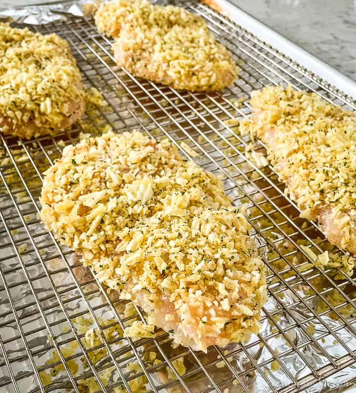 potato chip baked chicken on wire rack lined pan