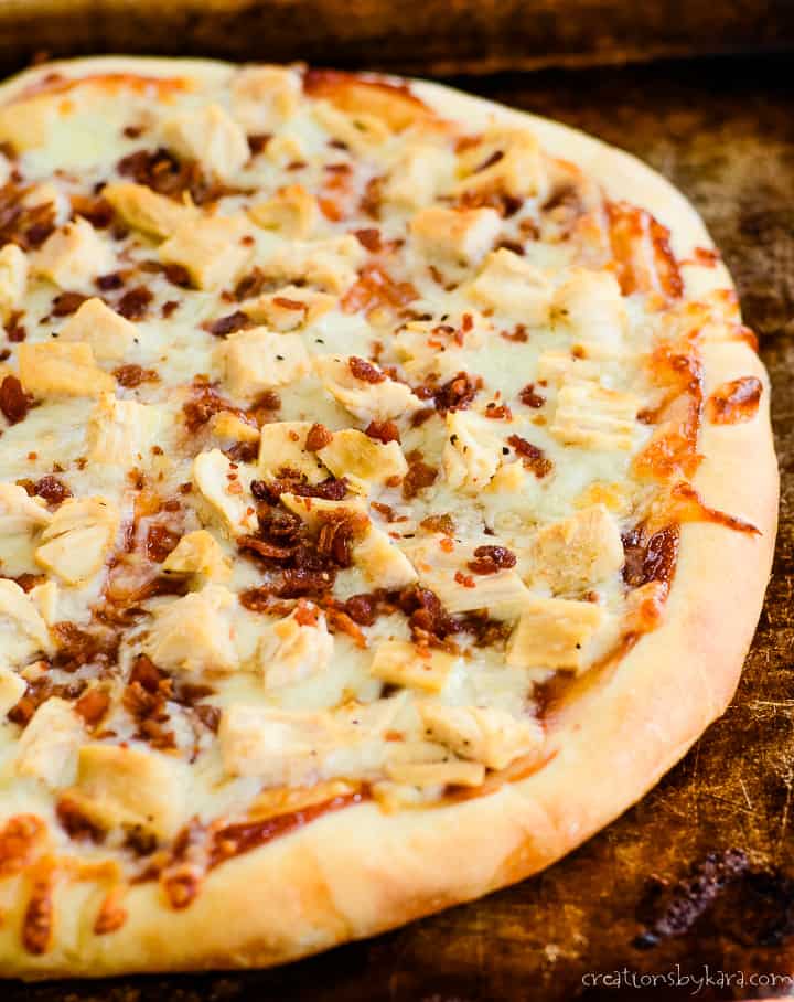 hot barbeque chicken pizza on a baking sheet