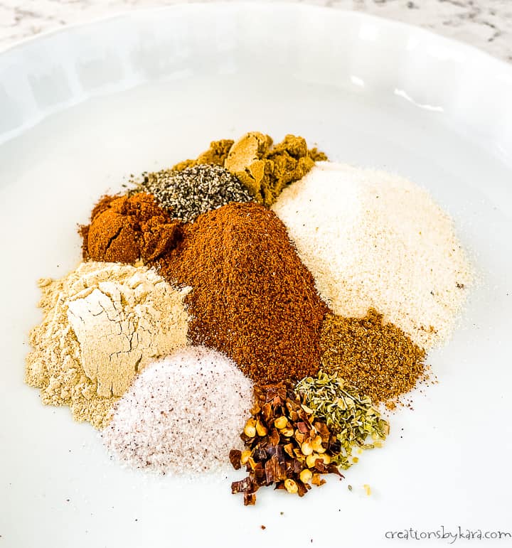 taco seasoning ingredients on a white plate