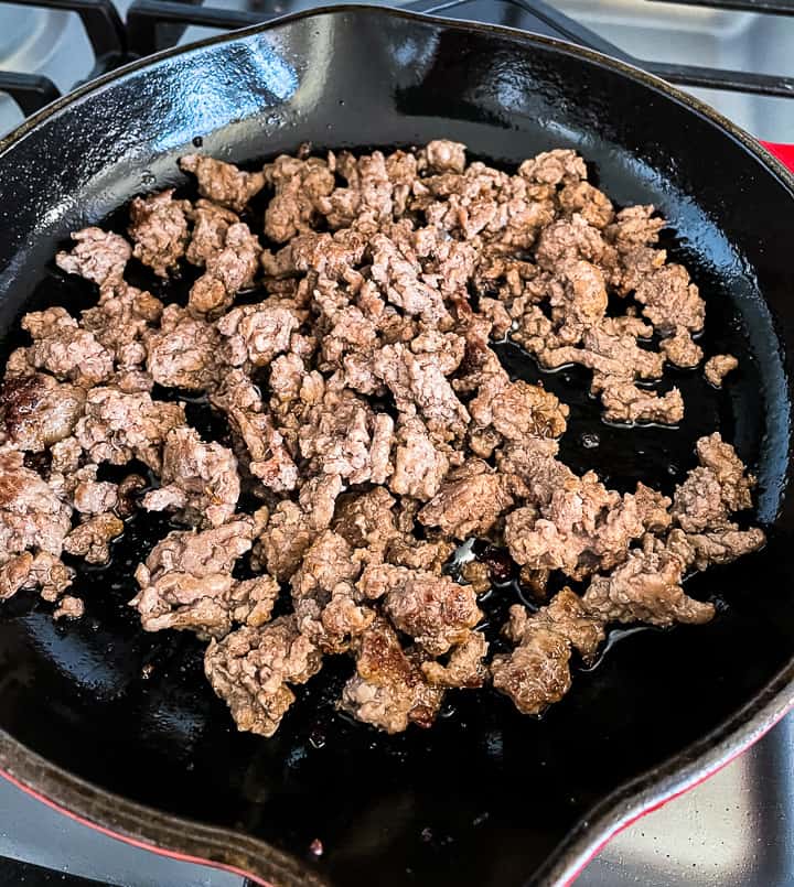 skillet with browned ground beef