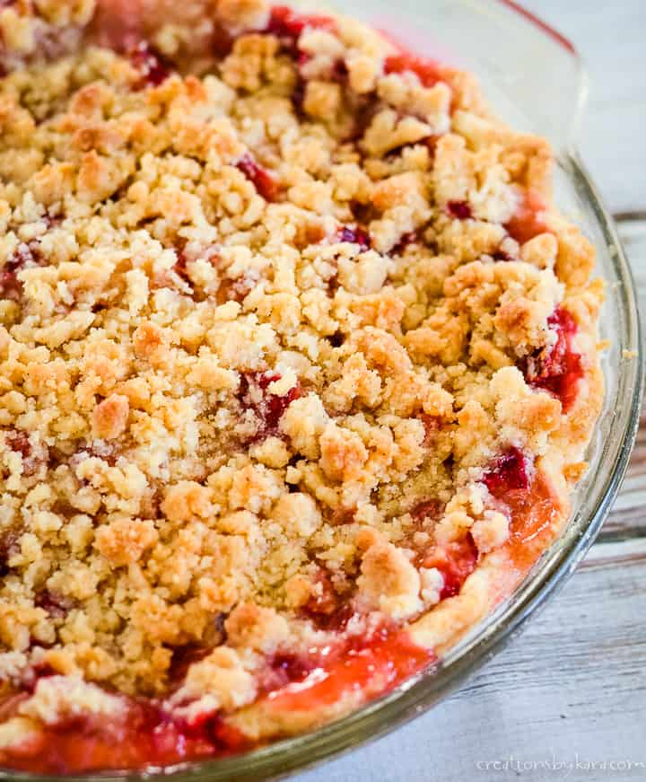 pan of plum pie with crumb topping