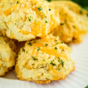 plate of keto cheddar biscuits with garlic butter glaze