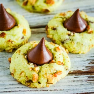 green pistachio cookies with a kiss on top