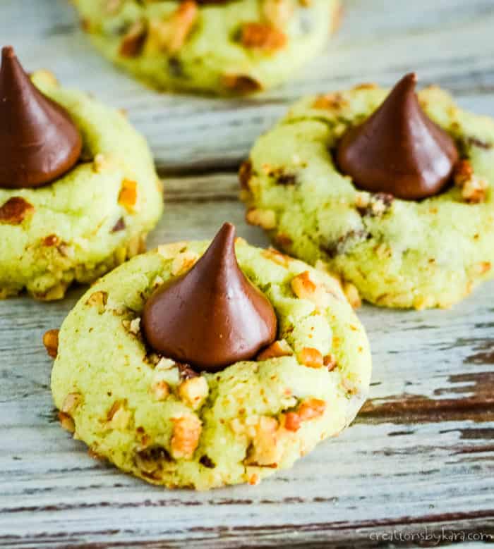 green pistachio cookies with a kiss on top