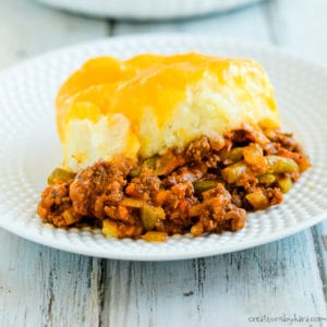 plate of serving of shepherd's pie with cheese