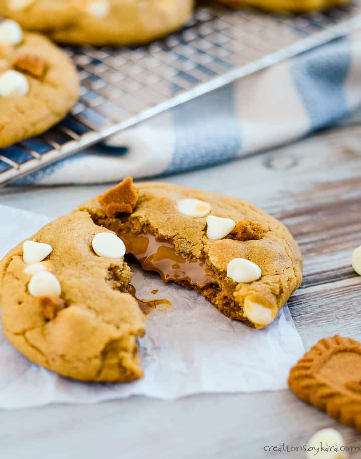 cookie butter cookies, one split in half on a piece of waxed paper