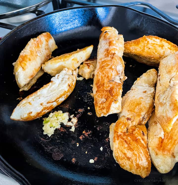 process shot - cooking garlic with chicken strips