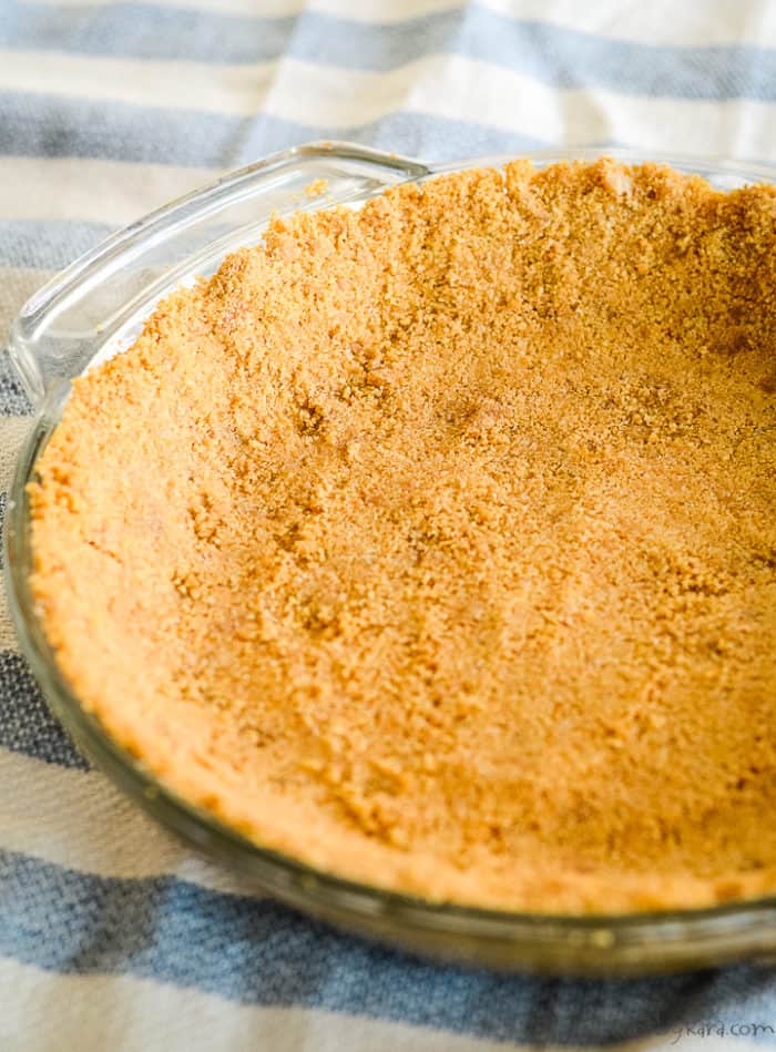 homemade graham cracker crust in a pie tin