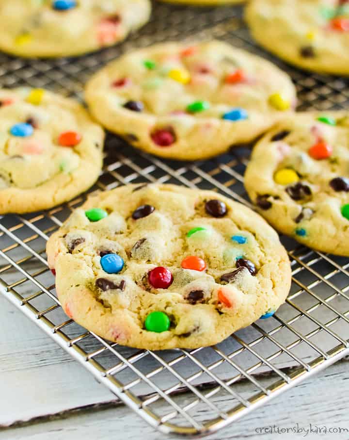  m&m chocolate chip cookies on a wire cooling rack
