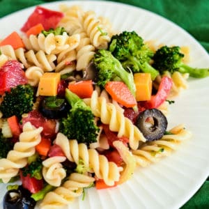 italian dressing pasta salad on a white plate