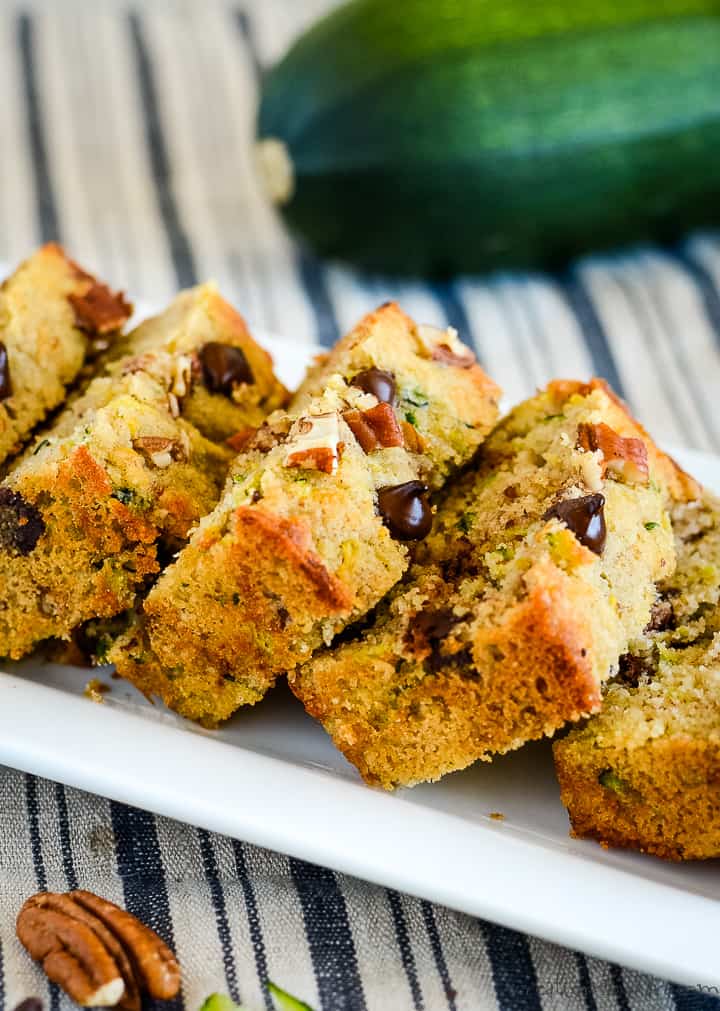 Made with almond flour, this LOW CARB ZUCCHINI BREAD is so moist and tasty you will want to make it all year long. Chocolate chips and nuts make it extra delicious! #ketozucchinibread #lowcarbzucchinibread #almondflourzucchinibread @Creations by Kara almond flour zucchini bread with chocolate chips