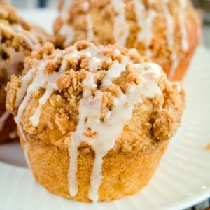 close up of apple crumble muffin with cinnamon glaze
