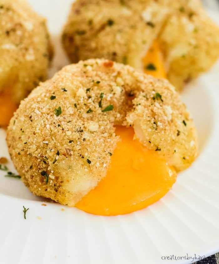 mashed potato balls filled with melted cheddar cheese