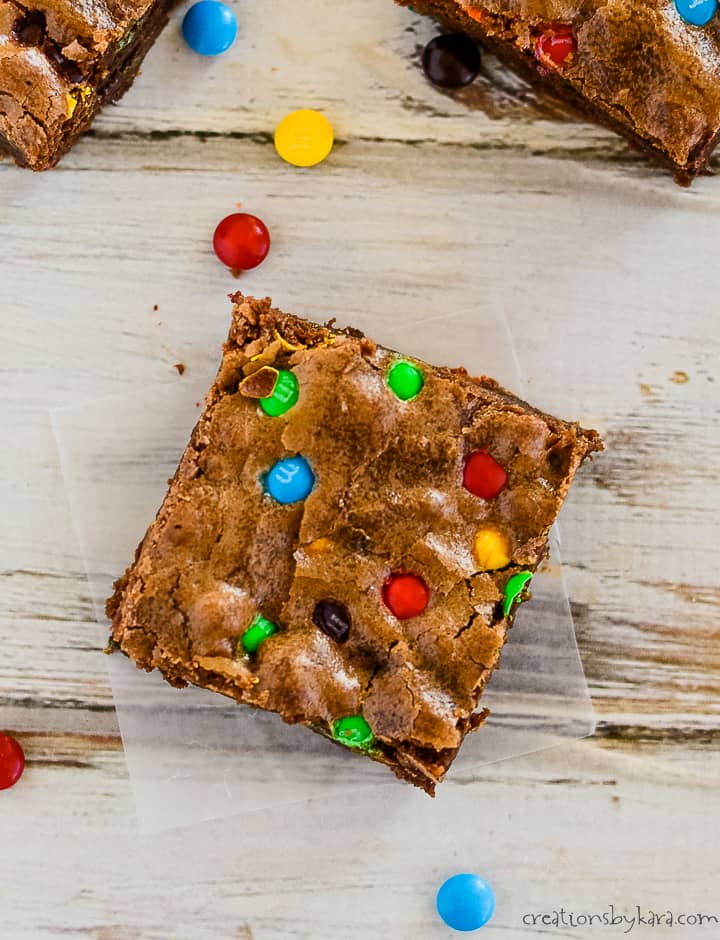 overhead shot of brownie sprinkled with m&m candies