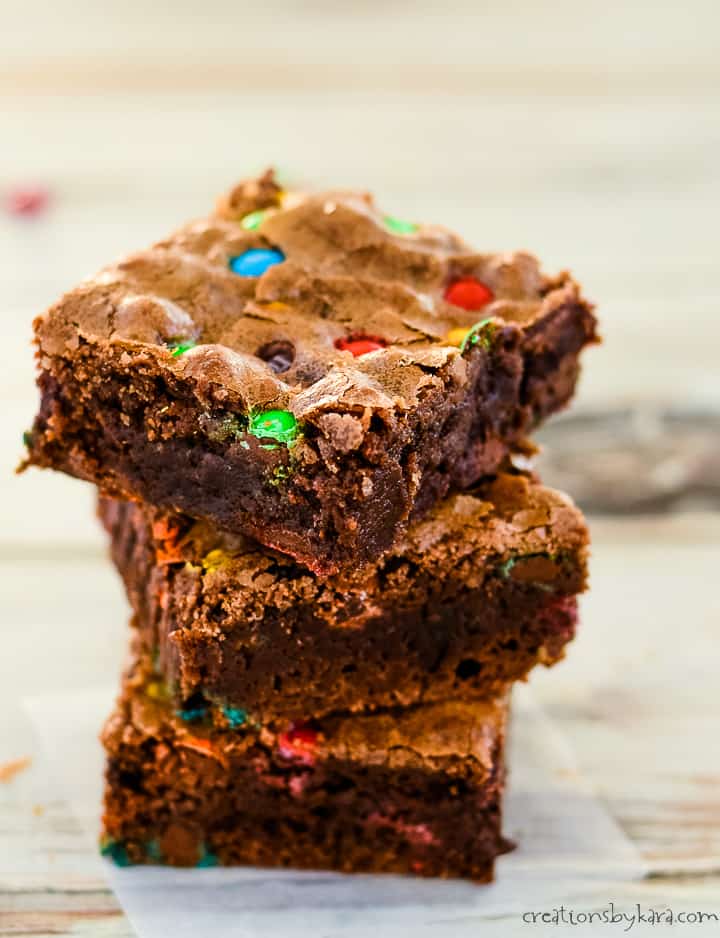 stack of homemade brownies with m&m's