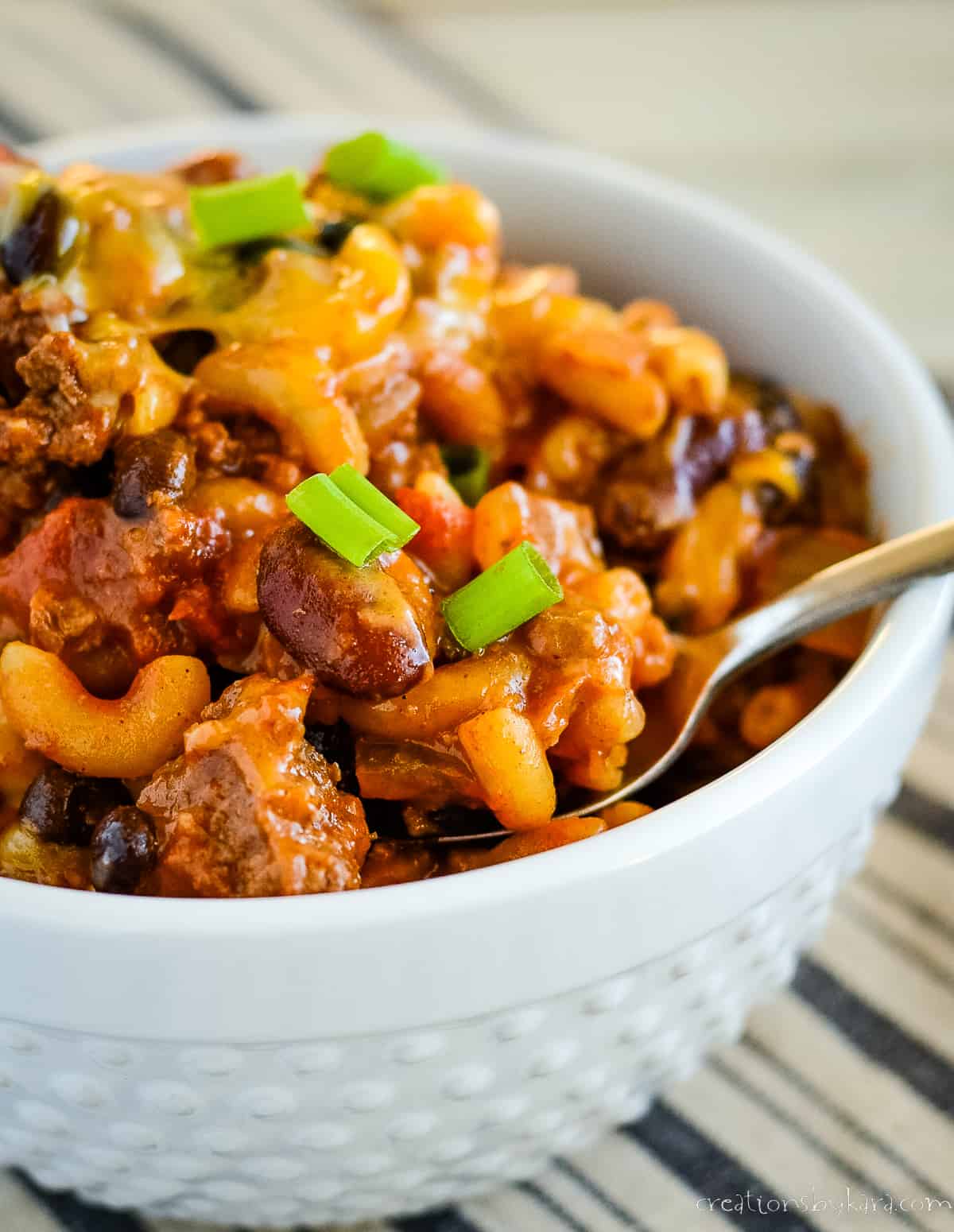 bowl of chili and macaroni with cheese