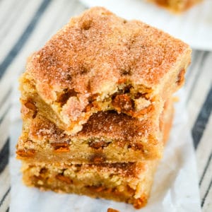 snickerdoodle blondies, one with a bite taken out of it