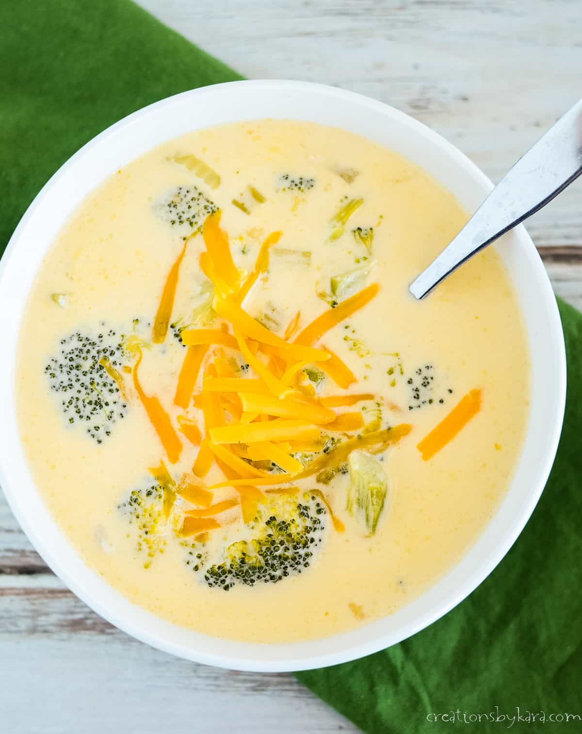 overhead shot of bowl of low carb broccoli cheese soup