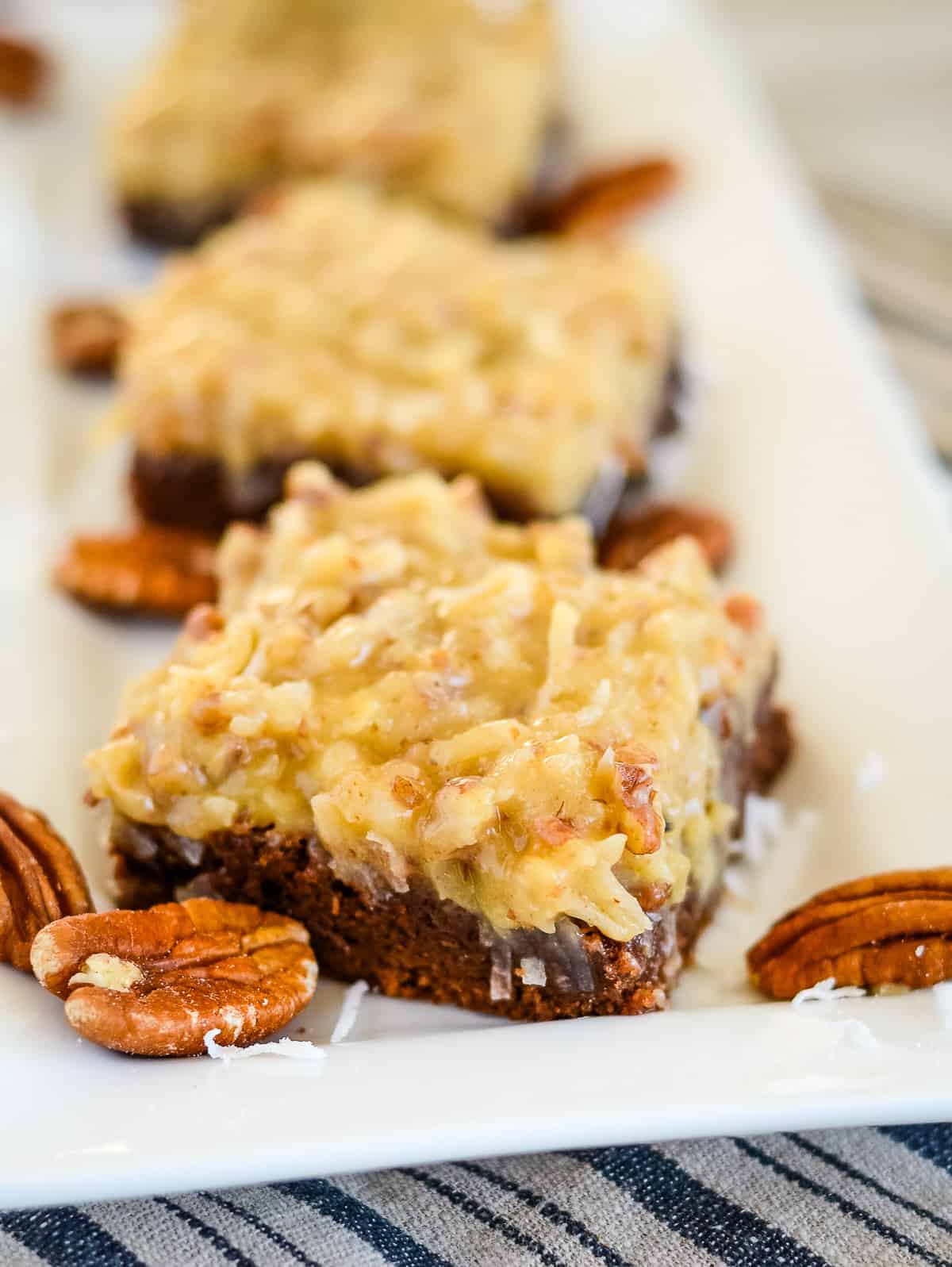 close up of tray of german chocolate brownies with pecans and coconut