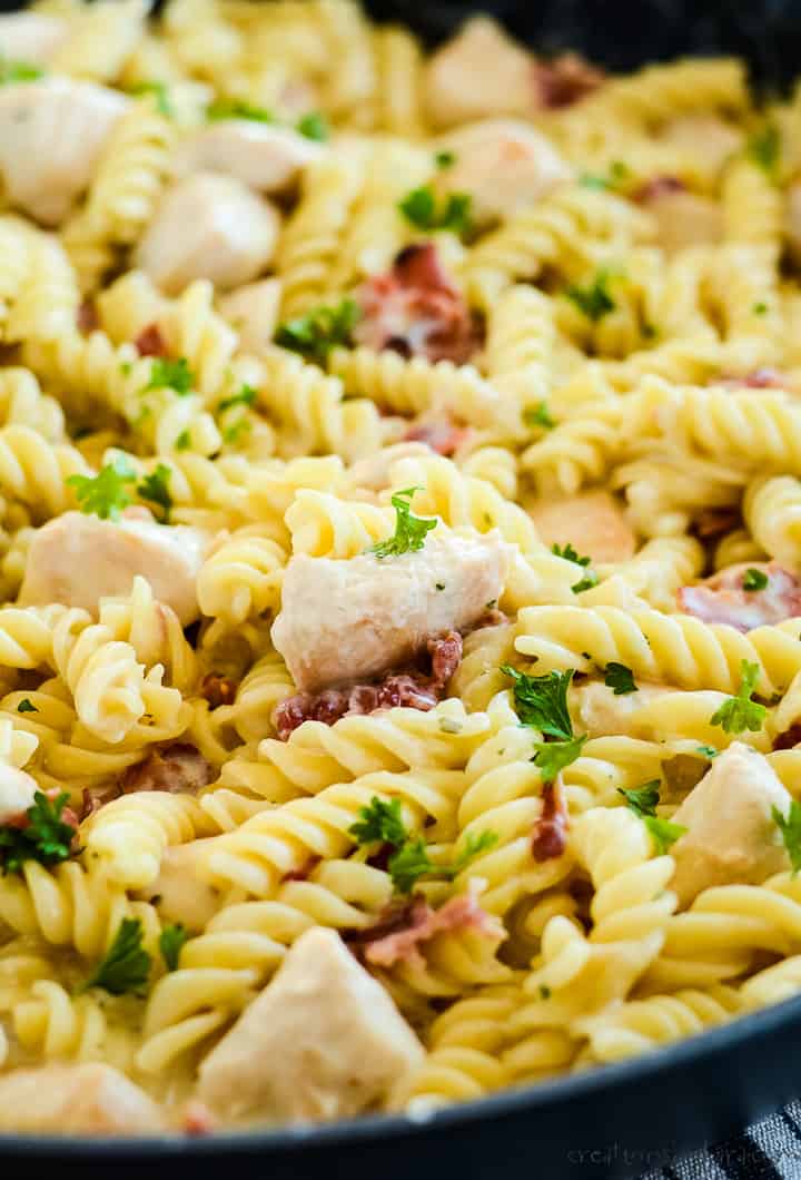 close up of chicken bacon pasta in a skillet