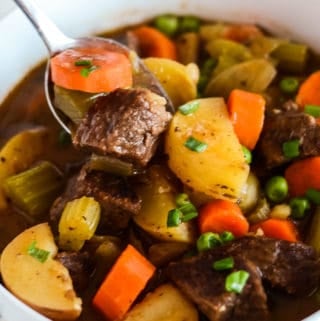 spoonful of stew in a bowl