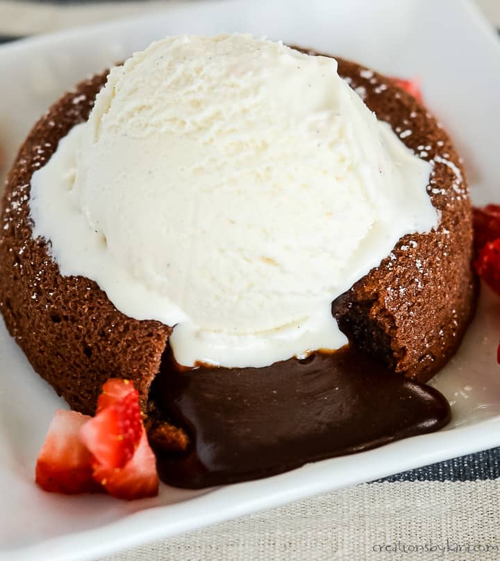 plate with molten lava cake with a scoop of ice cream
