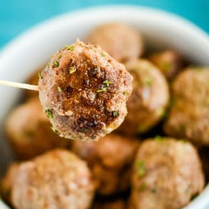 close up of meat ball on a toothpick