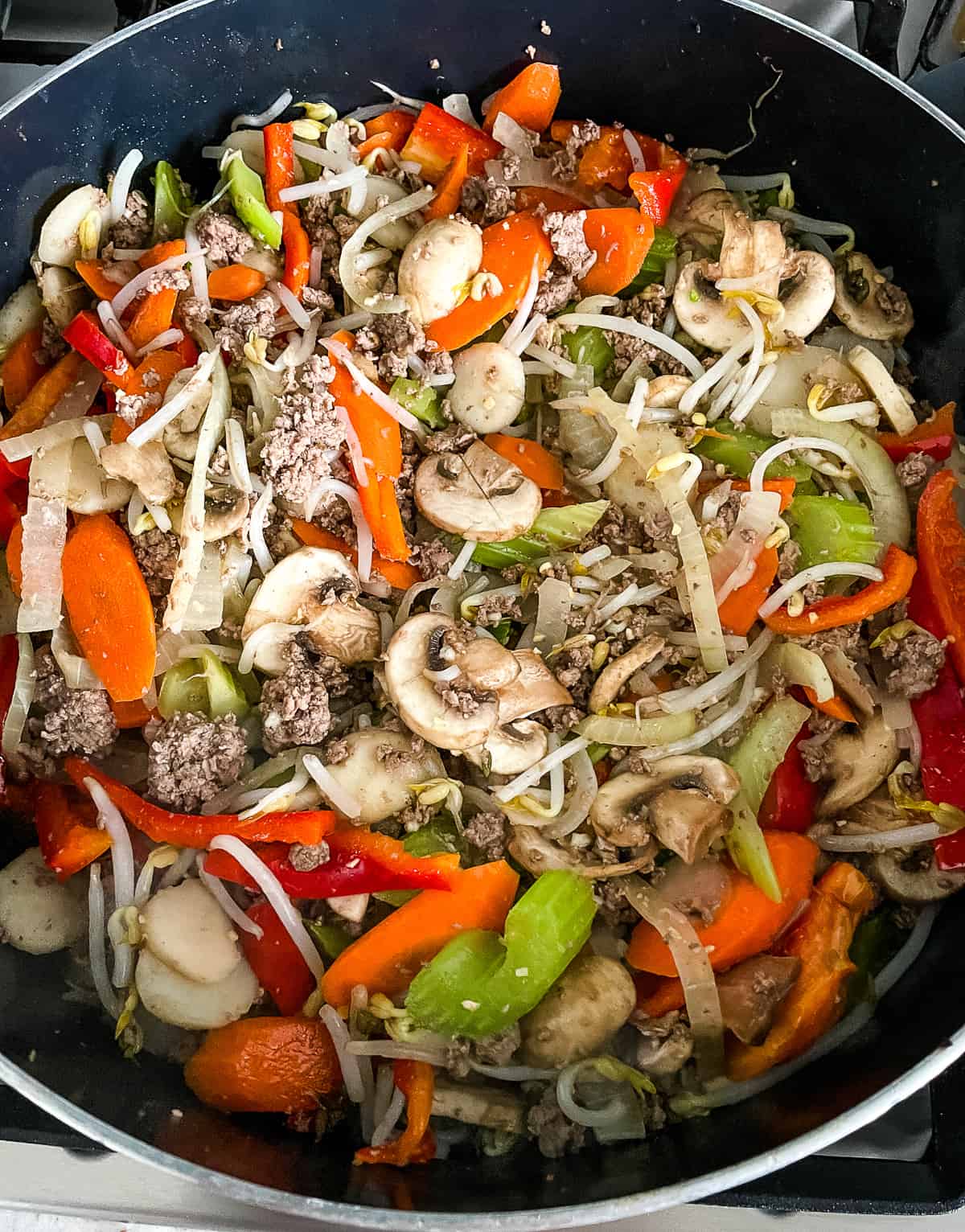 beef and vegetables in a large skillet