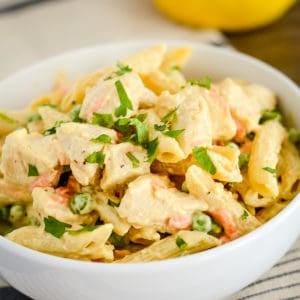 bowl of lemon pepper chicken pasta with vegetables