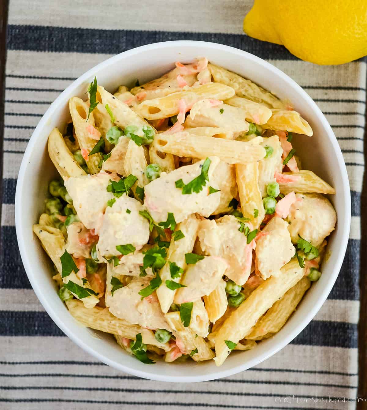 overhead shot of bowl of lemon pepper pasta chicken