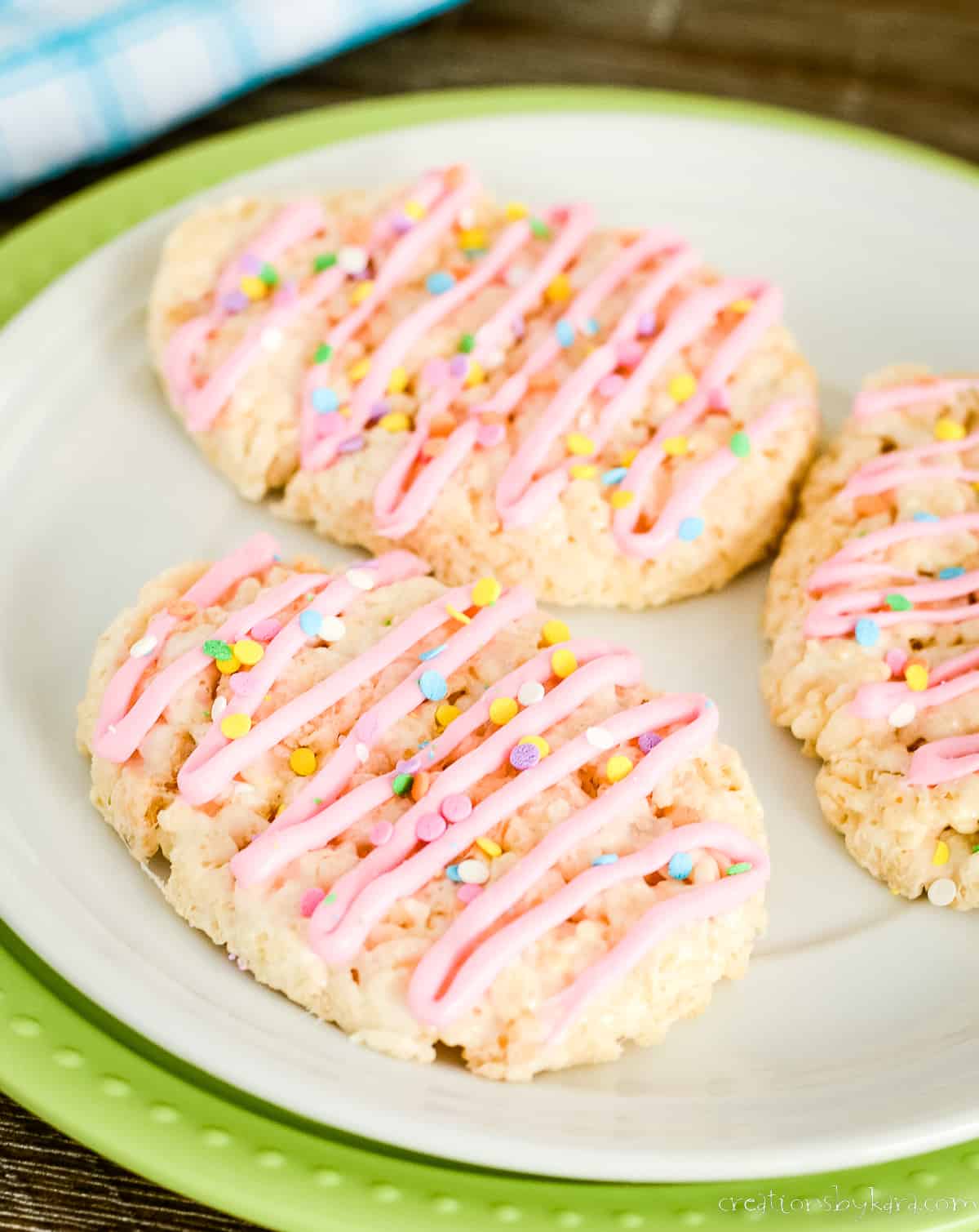 easter egg rice krispie treats with pink drizzle and sprinkles